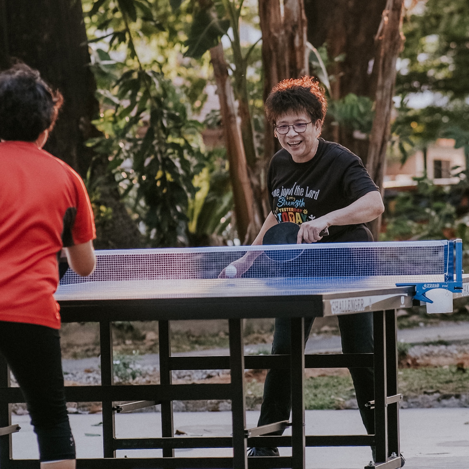 Young person playing table tennis